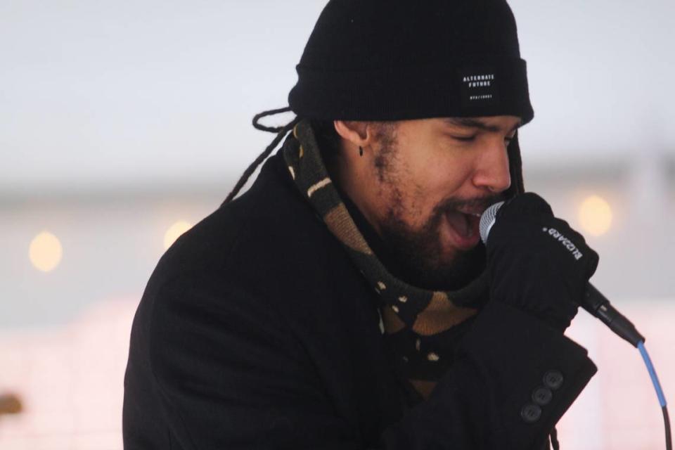 Pierce Freelon performs Jan. 15, 2022, at the unveiling of a new pop-up museum at Dorothea Dix Park in Raleigh. His late father, Phil Freelon, was a renowned architect who is featured in an exhibit at the park.