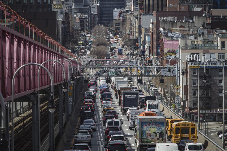 FILE - Congested traffic from Brooklyn enters Manhattan off the Williamsburg Bridge, March 28, 2019, in New York. Roadway deaths rose 7% during the first three months of 2022 to 9,560 people, the highest number for a first quarter in two decades, according to estimates by the National Highway Traffic Safety Administration. (AP Photo/Mary Altaffer, File)