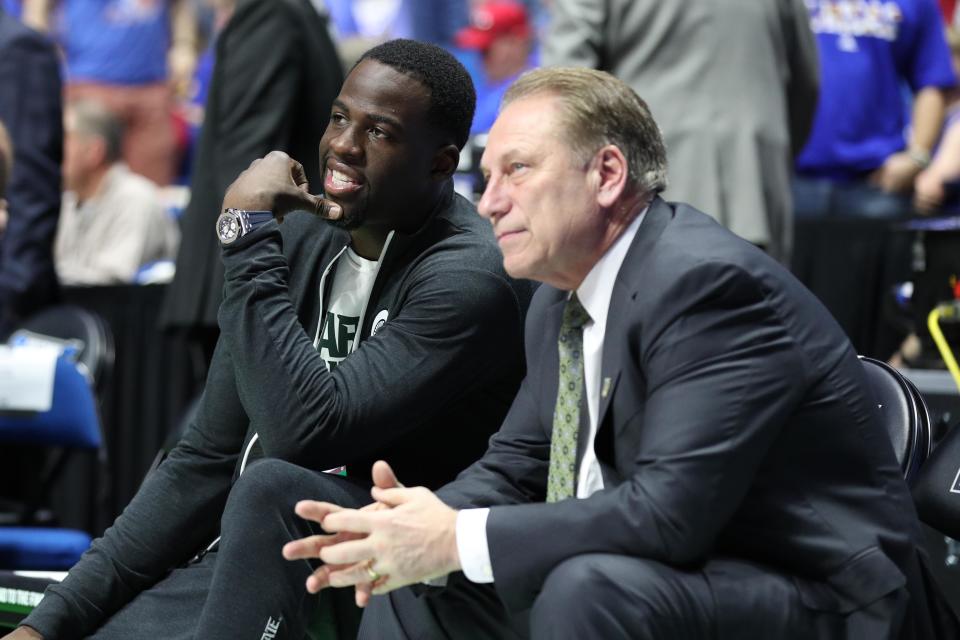 Mar 19, 2017; Tulsa, OK, USA; Golden State Warriors power forward Draymond Green speaks to Michigan State Spartans head coach Tom Izzo before the game between the Kansas Jayhawks and the Michigan State Spartans in the second round of the 2017 NCAA Tournament at BOK Center. Mandatory Credit: Brett Rojo-USA TODAY Sports