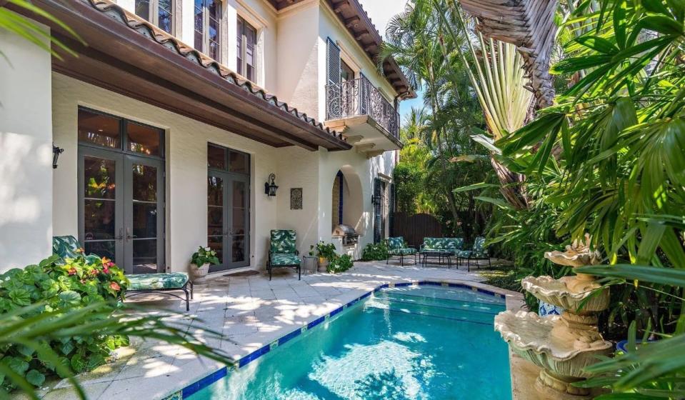 Just sold for a recorded $14 million, a townhouse at 401 Brazlian Ave. in Palm Beach has a private heated swimming pool.
