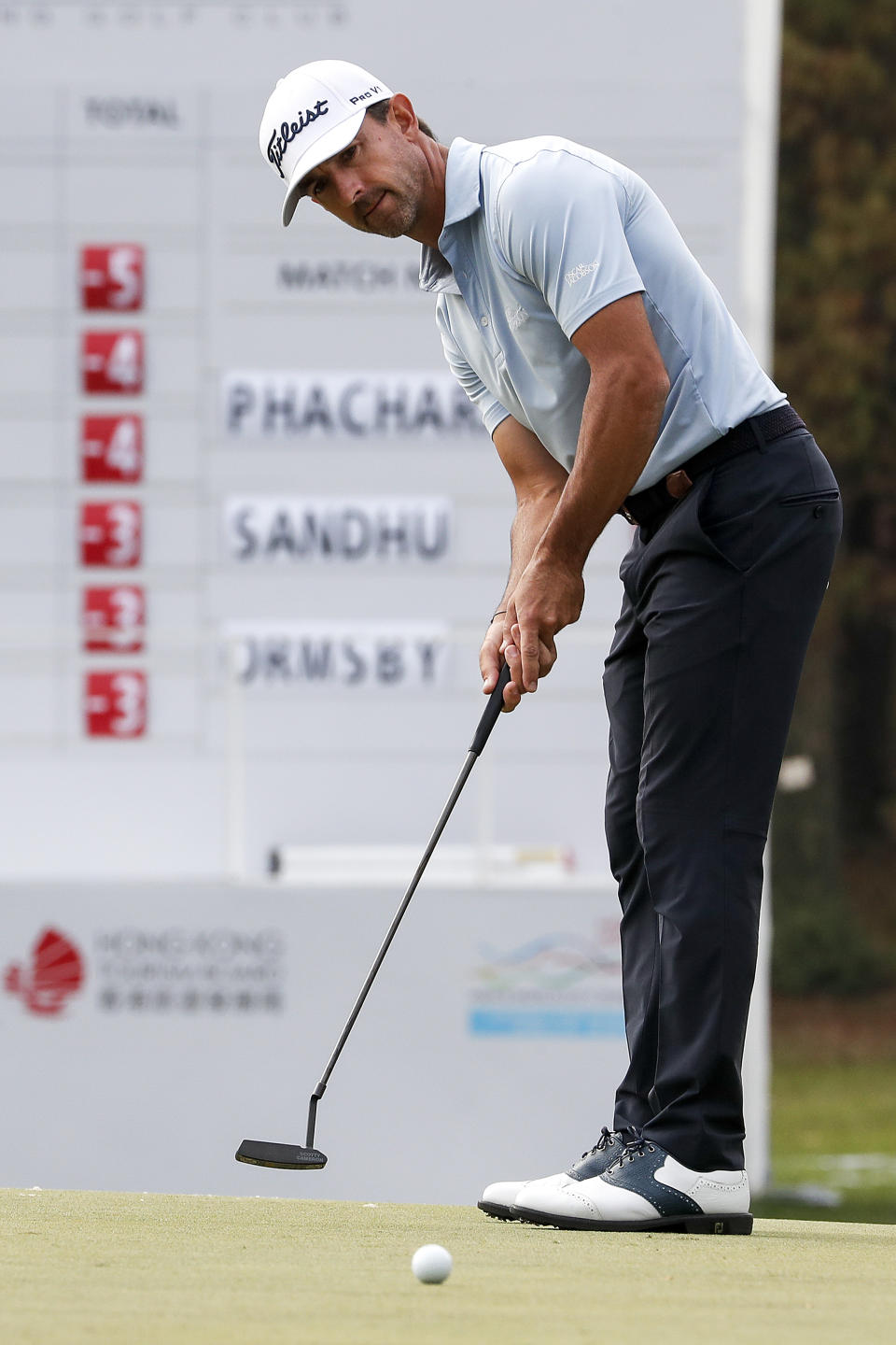 Wade Ormsby of Australia watches his putt on the 18th hole during the Hong Kong Open golf tournament at Fanling Golf Club in Hong Kong, Thursday, Jan. 9, 2020. (AP Photo/Andy Wong)