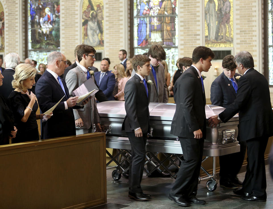 Louisiana Governor John Bel Edwards and his wife Donna watch as the Blanco family pallbearers bring the casket into the Cathedral during a Celebration of Life Interfaith Service for former Louisiana Gov. Kathleen Babineaux Blanco, at St. Joseph Cathedral in Baton Rouge, La., Thursday, Aug. 22, 2019. Thursday was the first of three days of public events to honor Blanco, the state's first female governor who died after a years long struggle with cancer.(AP Photo/Michael Democker, Pool)