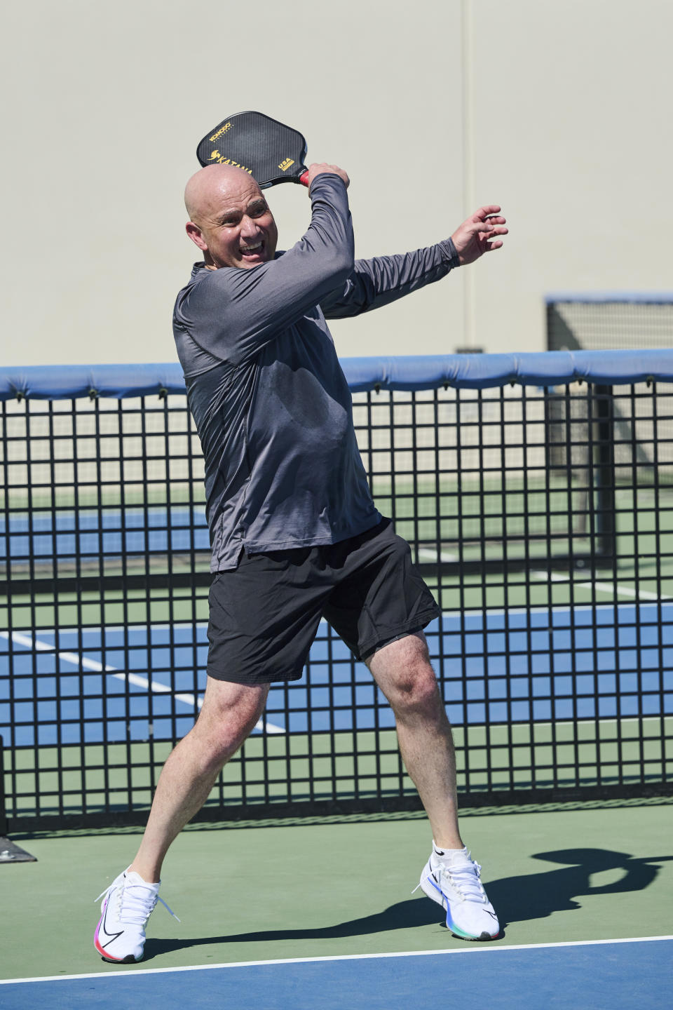In this photo provided by Horizon Sports & Experiences, Andre Agassi plays pickleball during a training session in Las Vegas, Sept. 28, 2023. Agassi watches pickleball videos, goes to his club every other day for pickleball matches and even had a hand in designing a pickleball paddle. He’s become driven with unlocking the best pickleball version of himself — just like he strived to do on the tennis court over a career that included eight Grand Slam singles titles.(Brenton Ho/Horizon Sports & Experience via AP)