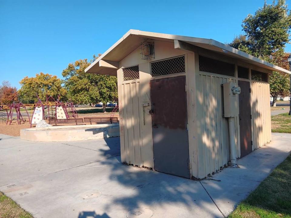 A parent said the Robertson Road Park bathroom, shown Wednesday, Nov. 29, 2023, has been locked in the eight years that she has been coming to the west Modesto site. The city locks bathrooms that are repeatedly vandalized or misused. The city is replacing this bathroom with one that is harder to damage and misuse.