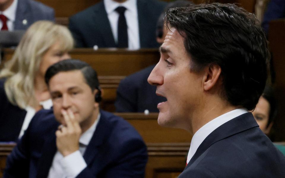 Justin Trudeau, Canada's prime minister, speaks as Pierre Poilievre, the Conservative leader, listens during question period in the House of Commons