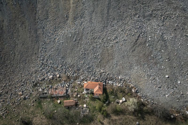 The Wider Image: In Serbian village, women fight to escape encroaching mine