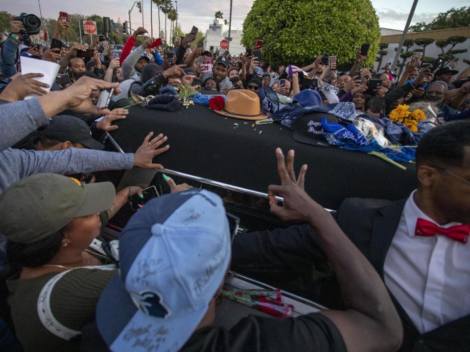 Nipsey Hussle funeral: Man shot dead and three injured in drive-by as mourners pay respects to rapper, police say