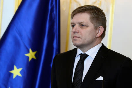 FILE PHOTO: Slovakia's Prime Minister Robert Fico reacts after a meeting of Slovakia’s three top officials at the Bratislava castle, Bratislava, Slovakia March 9, 2018. REUTERS/Radovan Stoklasa