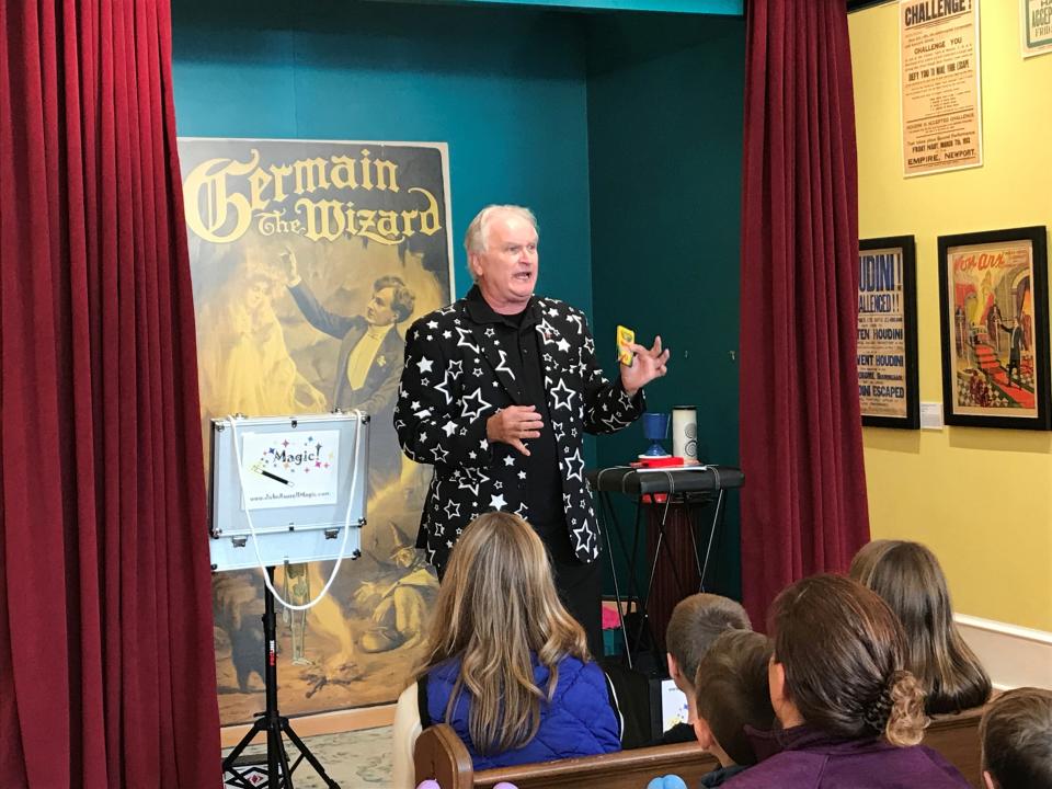 In this 2018 photo, magician John Russell performs during his magic show at the American Museum of Magic in downtown Marshall.