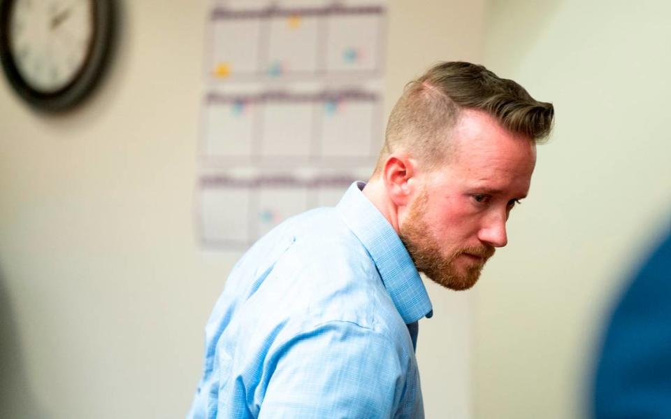 David Benjamin Coots who is charged with second-degree assault, third-degree rape, tampering with a witness, and five counts of violating a court order walks off after a motion to increase his bail at the Pierce County Superior Court on March 20, 2024, in Tacoma.