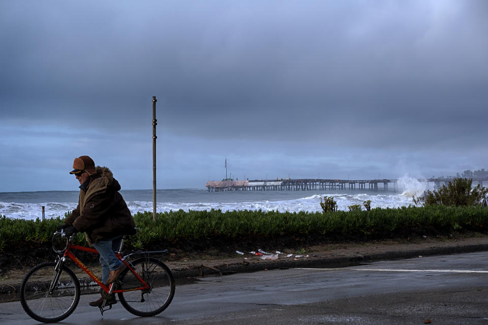 Large waves crash along the Southern California coast near the Ventura Pier in Ventura, Calif. on Saturday, Dec. 30, 2023. Since the Gold Rush, California's coast has been dotted by piers that have gone from serving steamships to becoming an integral part of many beach towns' identities, but rising seas and frequent storms due in part to climate change are threatening the iconic structures. (AP Photo/Richard Vogel)