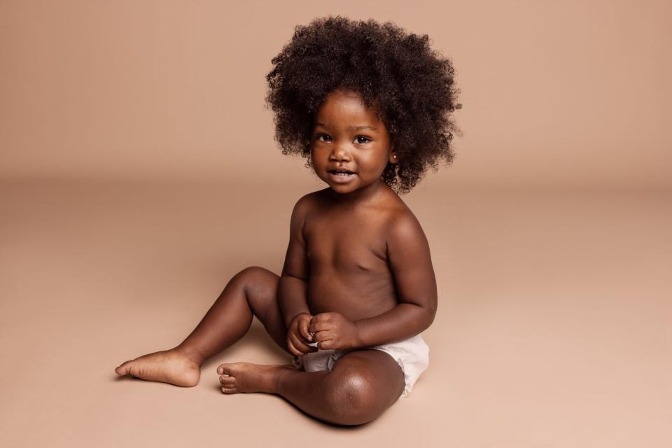 Aveeno Eczema Equality campaign black baby sitting for picture