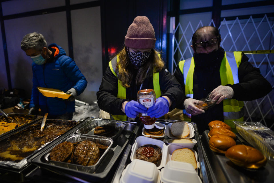 Volunteers from the Homeless Mobile Run distributing hot meals, drinks, treats, clothes and toiletries to people in need in Dublin. (Getty Images)