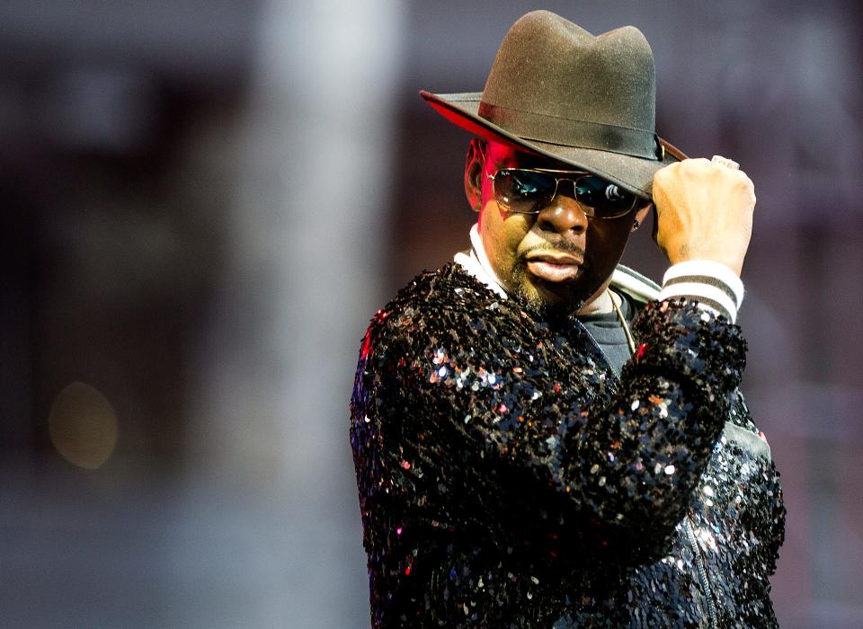 Bobby Brown tips his hat as he performs in 2019 with RBRM (the R&B supergroup featuring New Edition members) during the Cincinnati Music Festival at Paul Brown Stadium.