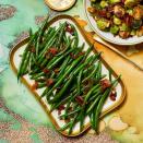 <p>No one can resist green beans drizzled with a tangy bacon vinaigrette.</p><p>Get the <strong><a href="https://www.womansday.com/food-recipes/a34131789/blanched-green-beans-recipe/" rel="nofollow noopener" target="_blank" data-ylk="slk:Blanched Green Beans recipe;elm:context_link;itc:0;sec:content-canvas" class="link ">Blanched Green Beans recipe</a></strong>. </p><p><a class="link " href="https://www.amazon.com/Masia-Sherry-Vinegar-Spain-Ounces/dp/B07FXYVXJJ?tag=syn-yahoo-20&ascsubtag=%5Bartid%7C10070.g.2641%5Bsrc%7Cyahoo-us" rel="nofollow noopener" target="_blank" data-ylk="slk:Shop Sherry Vinegar;elm:context_link;itc:0;sec:content-canvas">Shop Sherry Vinegar</a></p>