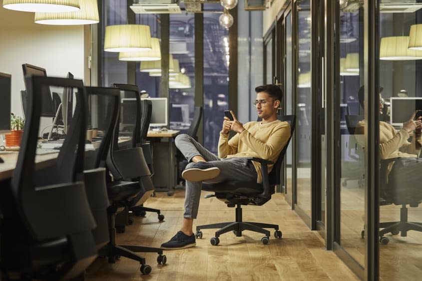 Man on phone in an office.