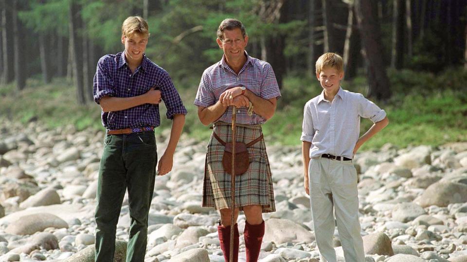 balmoral, united kingdom august 12 prince charles holding a walking stick styled as a shepherds crook stick with prince william and prince harry at polvier, by the river dee, balmoral castle estate photo by tim graham photo library via getty images