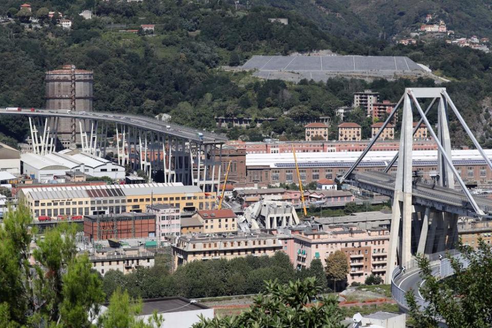 <p>This general view taken on Aug. 15, 2018, shows abandoned vehicles on the Morandi motorway bridge the day after a section collapsed in the north-western Italian city of Genoa. At least 38 people were killed on Aug. 14, when the giant motorway bridge collapsed in Genoa in northwestern Italy. The collapse, which saw a vast stretch of the A10 freeway tumble on to railway lines in the northern port city, was the deadliest bridge failure in Italy for years, and the country’s deputy transport minister warned the death toll could climb further. (Photo from Valery Hache/AFP/Getty Images) </p>