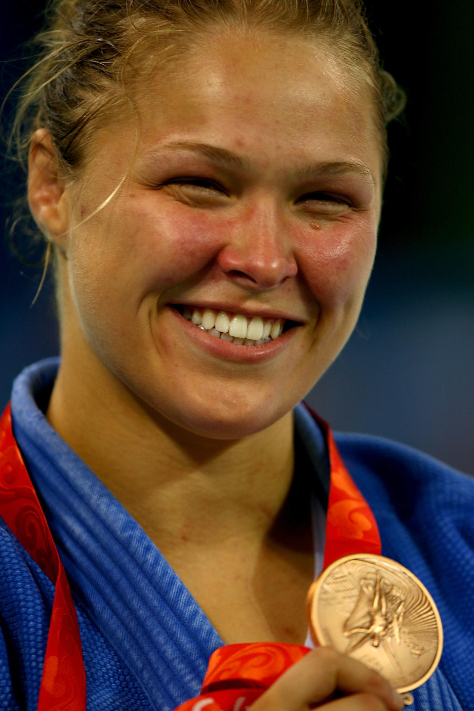 <p>MMA champion and action movie star Ronda Rousey became the first American woman to win an Olympic medal in judo when she took bronze at the 2008 Summer Games in Beijing. (Getty) </p>