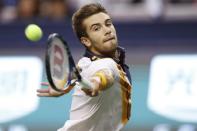 Tennis - Shanghai Masters - Men's Singles - Final - Qi Zhong Tennis Center, Shanghai, China - October 14, 2018. Borna Coric of Croatia in action against Novak Djokovic of Serbia. REUTERS/Aly Song