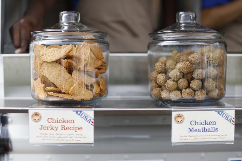 Jars of dog treats are seen at the Milo's Kitchen Treat Truck in San Francisco, California, June 27, 2014. Milo's Kitchen, a San Francisco-based pet food company, on Friday started its nationwide food truck tour specifically catered to dogs. REUTERS/Stephen Lam (UNITED STATES - Tags: BUSINESS ANIMALS)