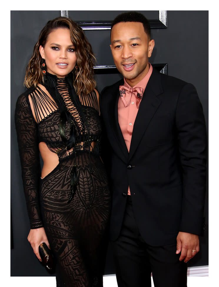 Chrissy Teigen and John Legend often sing each other's praises. (Photo by Dan MacMedan/WireImage)