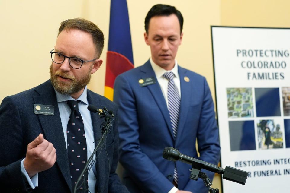 Republican Colorado State Rep. Matt Soper and Democratic Sen. Dylan Roberts appear at a March  news conference to unveil bipartisan legislation to license funeral home professionals in Colorado; Soper tells The Independent that, when he first began delving into the issue, ‘I could not believe how few rules there were in this space’ (Associated Press)