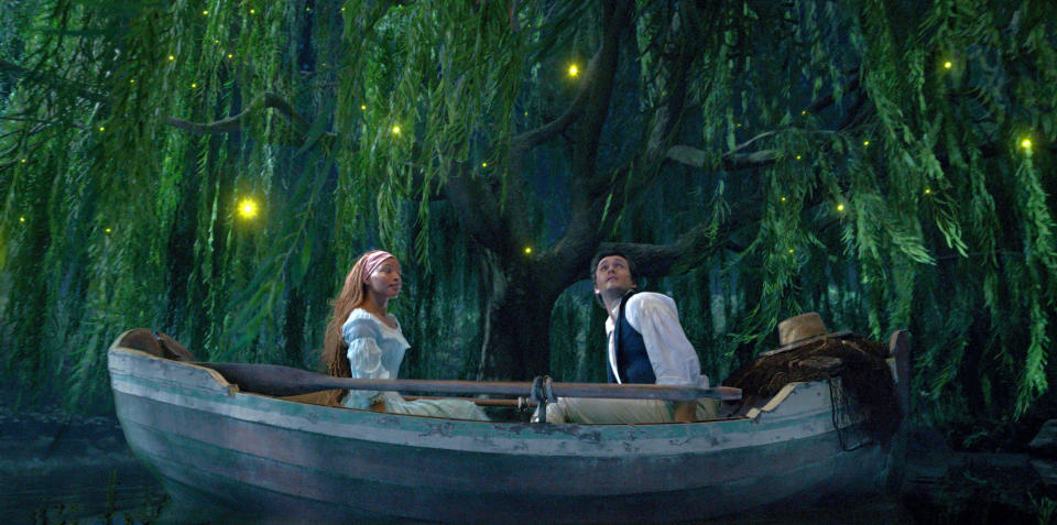 This image released by Disney shows Halle Bailey as Ariel and Jonah Hauer-King as Prince Eric in "The Little Mermaid." (Disney via AP)