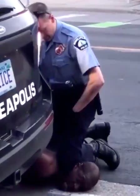 Video captured by a bystander appears to show a Minneapolis police officer pressing his knee into the neck of a handcuffed Black man named George Floyd. (Photo: Twitter)