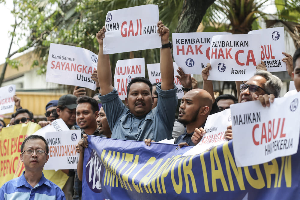 Utusan Malaysia workers protest over unpaid salaries in front of Utusan headquarters in Kuala Lumpur August 19, 2019. — Picture by Ahmad Zamzahuri