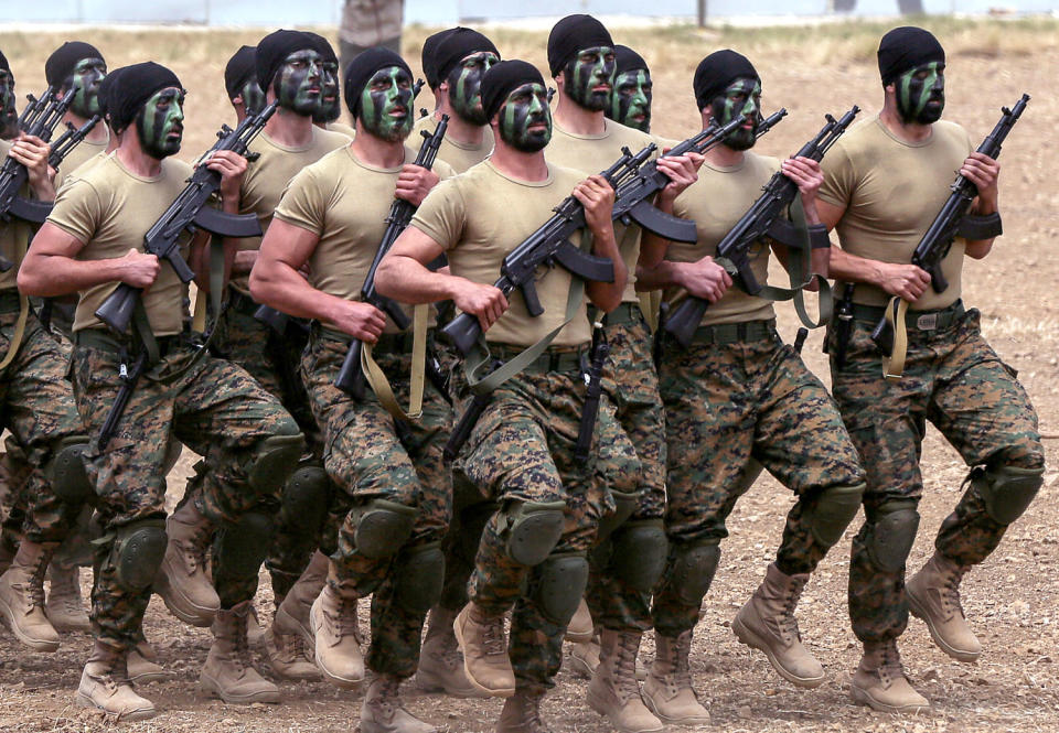 Hezbollah fighters military exercise in Lebanon. (Marwan Naamani / picture alliance via Getty Images fle)