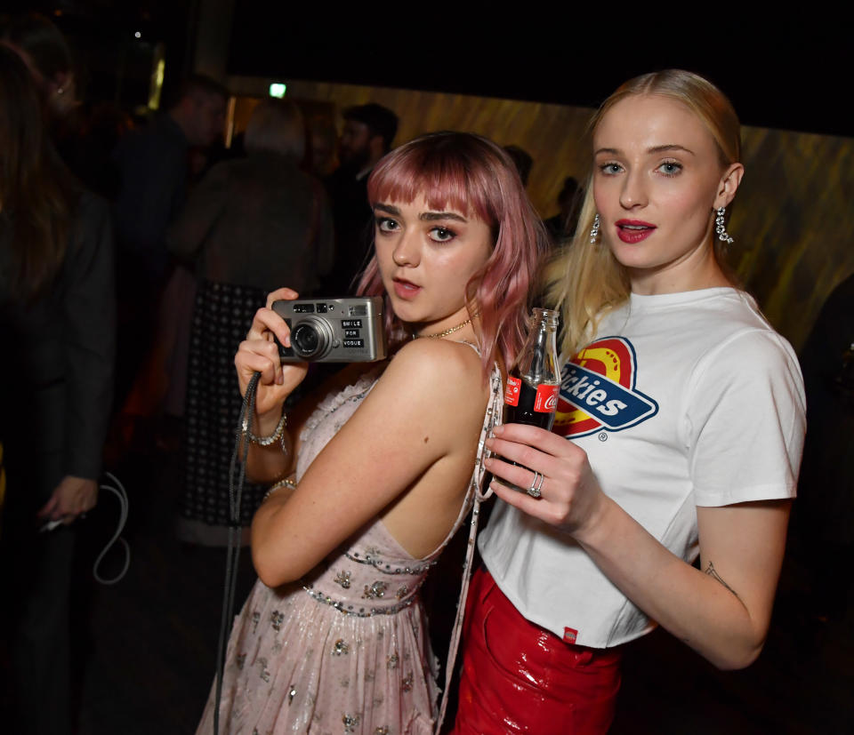 Maisie Williams and Sophie Turner at the "Game of Thrones" season finale premiere in Belfast in April. (Photo: Jeff Kravitz via Getty Images)