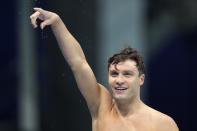 Robert Finke of the United States celebrates winning the men's 800-meters freestyle final at the 2020 Summer Olympics, Thursday, July 29, 2021, in Tokyo, Japan. (AP Photo/Matthias Schrader)