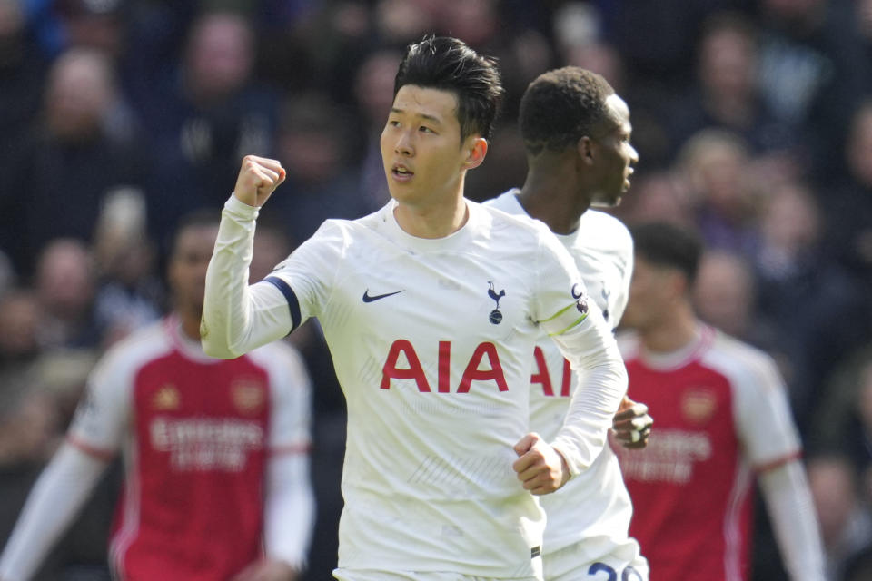 Tottenham's Son Heung-min celebrates after scoring his side's second goal from a penalty shot during the English Premier League soccer match between Tottenham Hotspur and Arsenal at the Tottenham Hotspur Stadium in London, England, Sunday, April 28, 2024. (AP Photo/Kin Cheung)