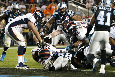 Denver Broncos' C.J. Anderson scores a touchdown in the fourth quarter. REUTERS/Lucy Nicholson