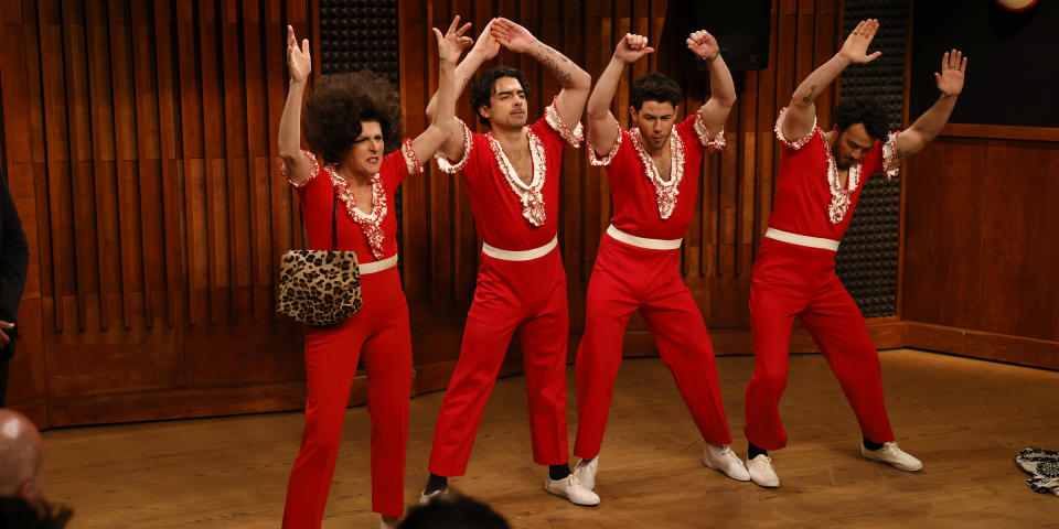 Molly Shannon as Sally O’Malley, Joe Jonas, Nick Jonas, and Kevin Jonas during the “Sally O’Malley” sketch on Saturday, April 8, 2023. (Will Heath / NBC)