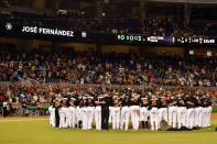 <p>Miami Marlins teammates gather around the mound to honor teammate starting pitcher Jose Fernandez after defeating the New York Mets 7-3 at Marlins Park. Mandatory Credit: Jasen Vinlove-USA TODAY Sports </p>