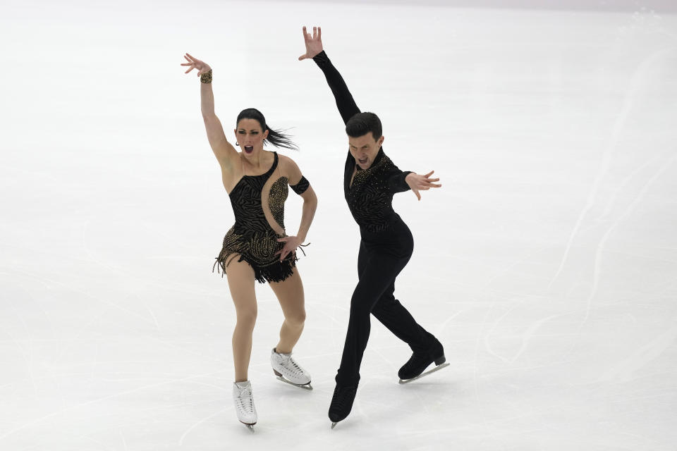 Italy's Charlene Guignard and Marco Fabbri compete during the Ice Dance Rhythm Dance at the figure skating Grand Prix finals at the Palavela ice arena, in Turin, Italy, Friday, Dec. 9, 2022. (AP Photo/Antonio Calanni)