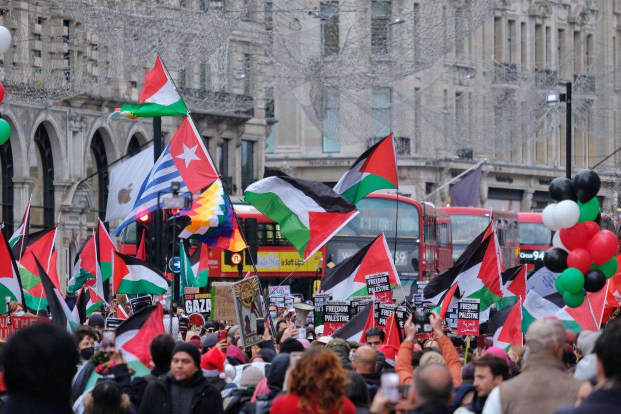 London, UK. 23rd December, 2023. Feminist activist group Sisters Uncut organised a protest in the central shopping areas of Oxford Street and Regent Street, supporting a full ceasefire in Gaza and the boycott of Israeli linked - or owned businesses. Credit: Eleventh Hour Photography/Alamy Live News