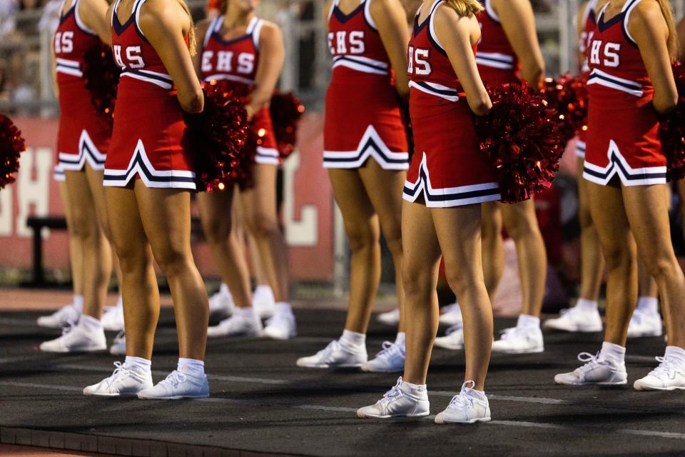 East’s cheer team watches the game at their high school football season opener against Orem at East High School in Salt Lake City on Friday, Aug. 11, 2023. | Megan Nielsen, Deseret News