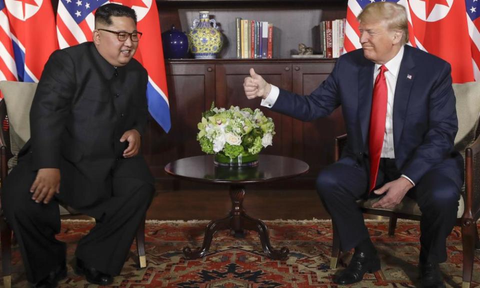 Donald Trump gives Kim Jong-un a thumbs-up at their meeting on Sentosa island in Singapore.