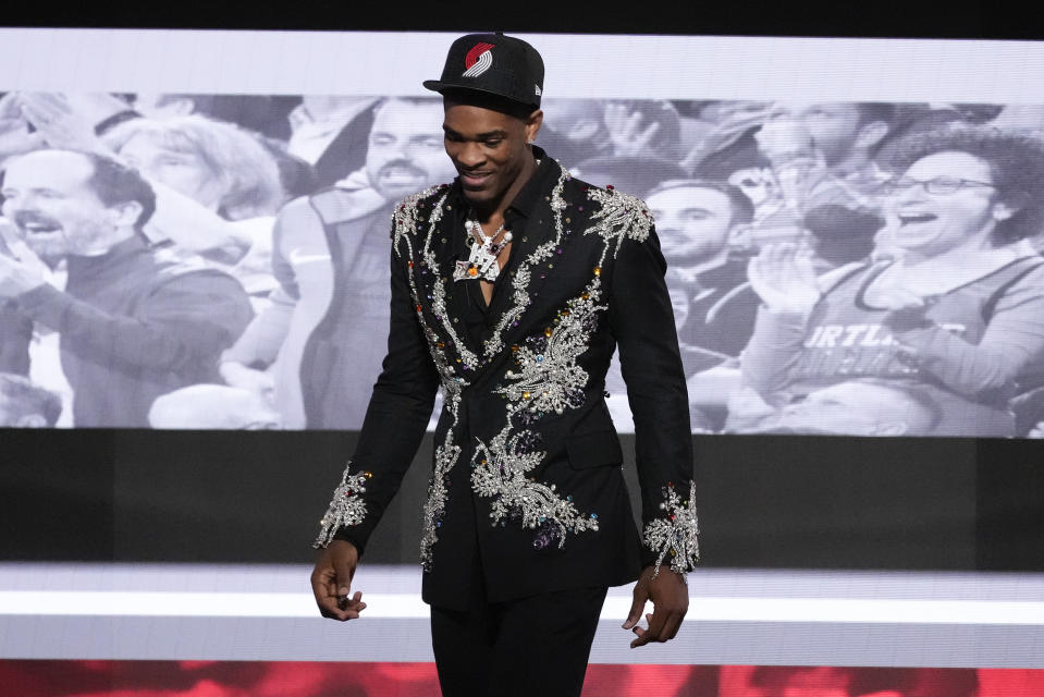 Scoot Henderson,reacts after being selected third overall by the Portland Trail Blazers during the NBA basketball draft, Thursday, June 22, 2023, in New York. (AP Photo/John Minchillo)