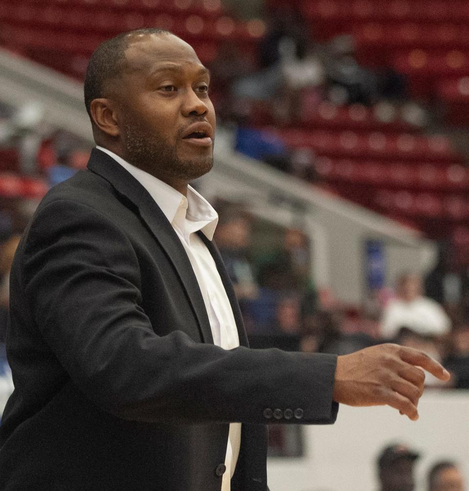 Lake Worth High School head coach Frank Baxley instructs his players during the second half against Columbus High School during the FHSAA Boys 7A semifinal game at The RP Funding Center in Lakeland Friday afternoon. March 4, 2022. MICHAEL WILSON | LEDGER CORRESPONDENT