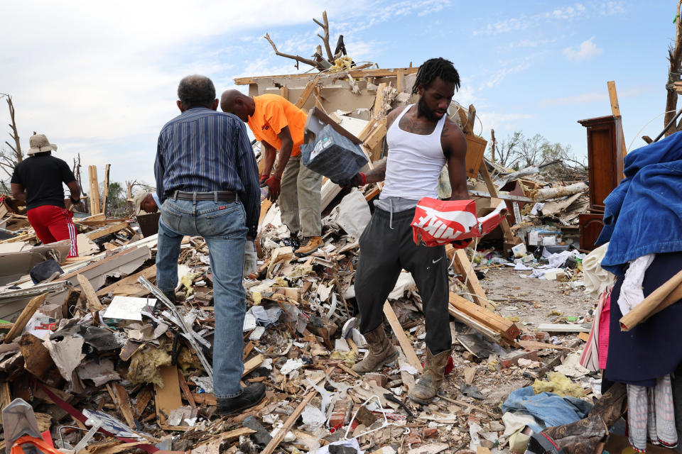 Residents continue to recover possessions from homes that were destroyed by a tornado in Rolling Fork, Miss. (Scott Olson / Getty Images)