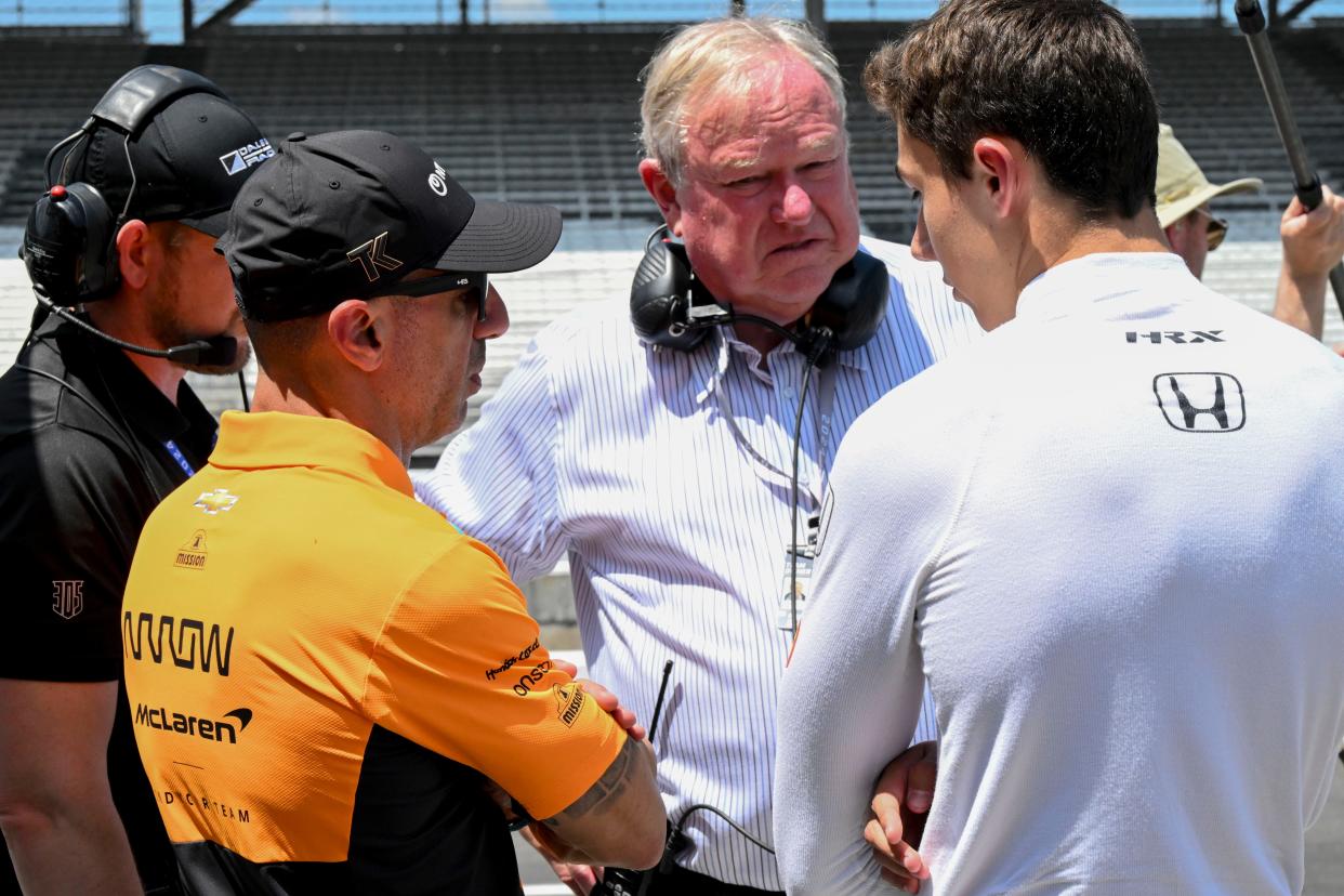 Charlie Kimball (from left), Tony Kanaan and Dale Coyne talk with Dale Coyne Racing driver Nolan Siegel (18) oin Sunday, May 19, 2024, during practice ahead of qualifying for the 108th running of the Indianapolis 500 at Indianapolis Motor Speedway.