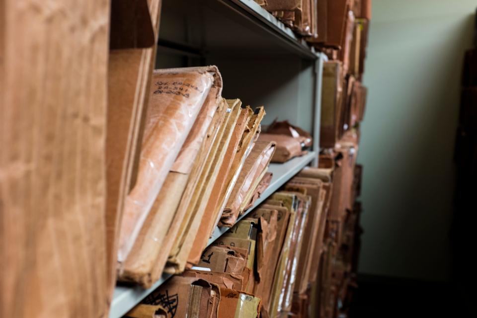 A small room filled with hand-cranked, moving storage shelves at the District II Office of the State Engineer in Roswell.