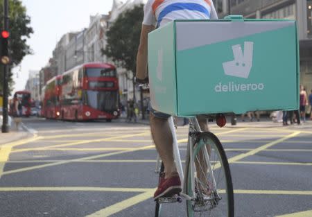 A cyclist delivers food for Deliveroo in London, Britain, September 15, 2016. REUTERS/Toby Melville