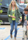 Celebrities in neon fashion: Heidi Klum dressed down her neon top with skinny jeans. <br><br>[Rex]