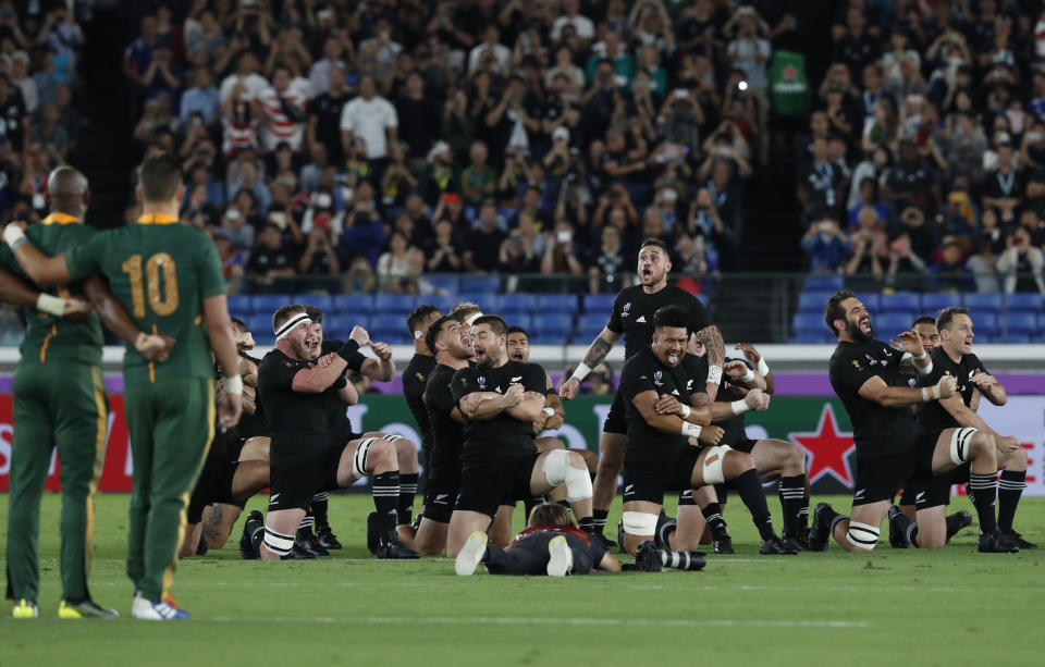 New Zealand's All Blacks perform their haka ahead of the start of the Rugby World Cup Pool B game between New Zealand and South Africa in Yokohama, Japan, Saturday, Sept. 21, 2019. (AP Photo/Shuji Kajiyama)