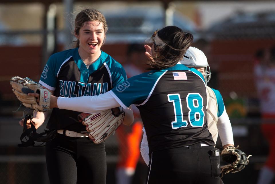 Sultana’s Savannah Vanderpool, left, celebrates with teammates Avery Rodriguez and Isabel Avalos after the sixth inning on Thursday, March 19, 2023. Sultana defeated Apple Valley 9-5.